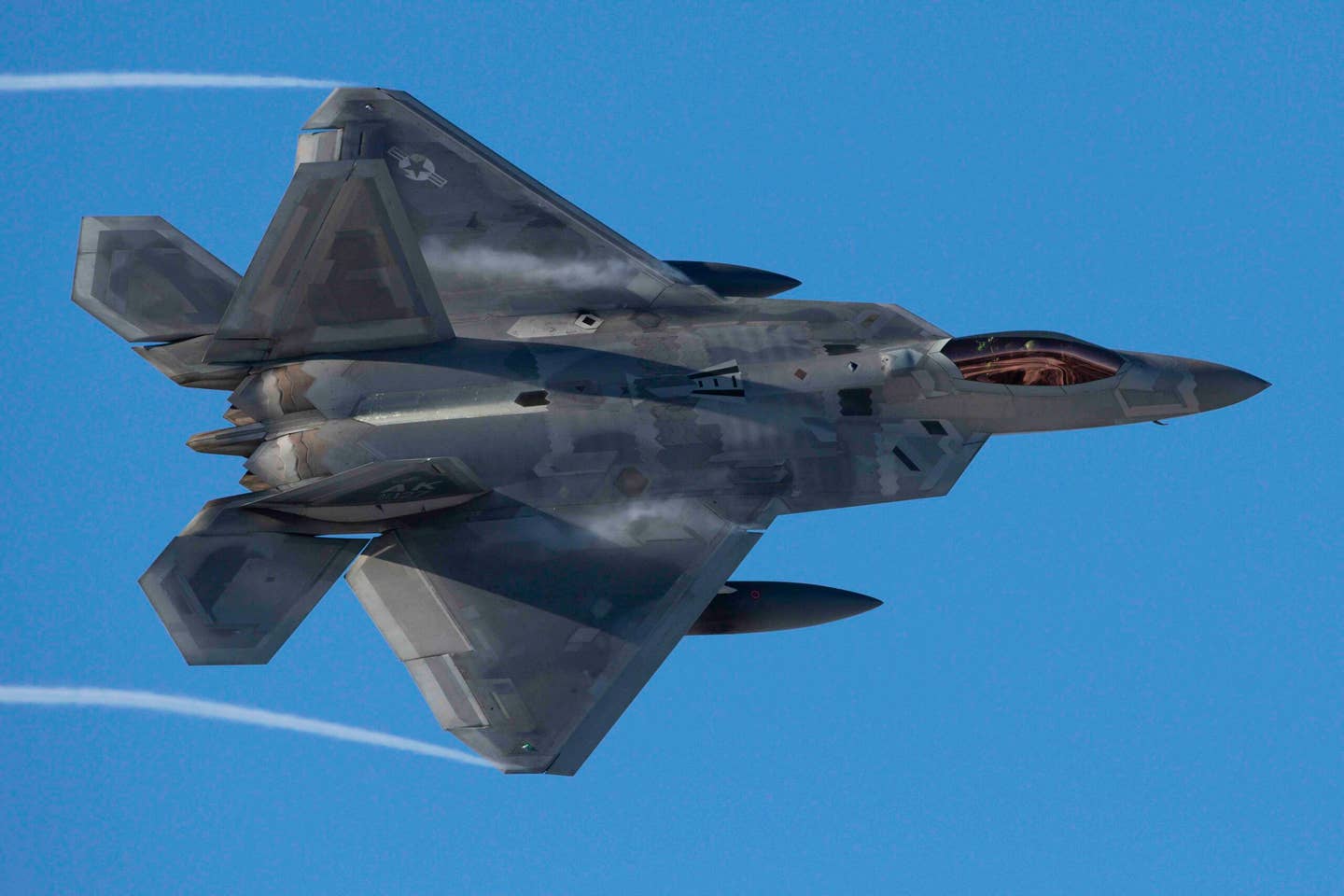 A U.S. Air Force F-22 Raptor assigned to the 3rd Wing takes off from Joint Base Elmendorf-Richardson, Alaska, in support of Polar Force 22-4, March 30, 2022. <em>U.S. Air Force photo by Alejandro Peña</em>