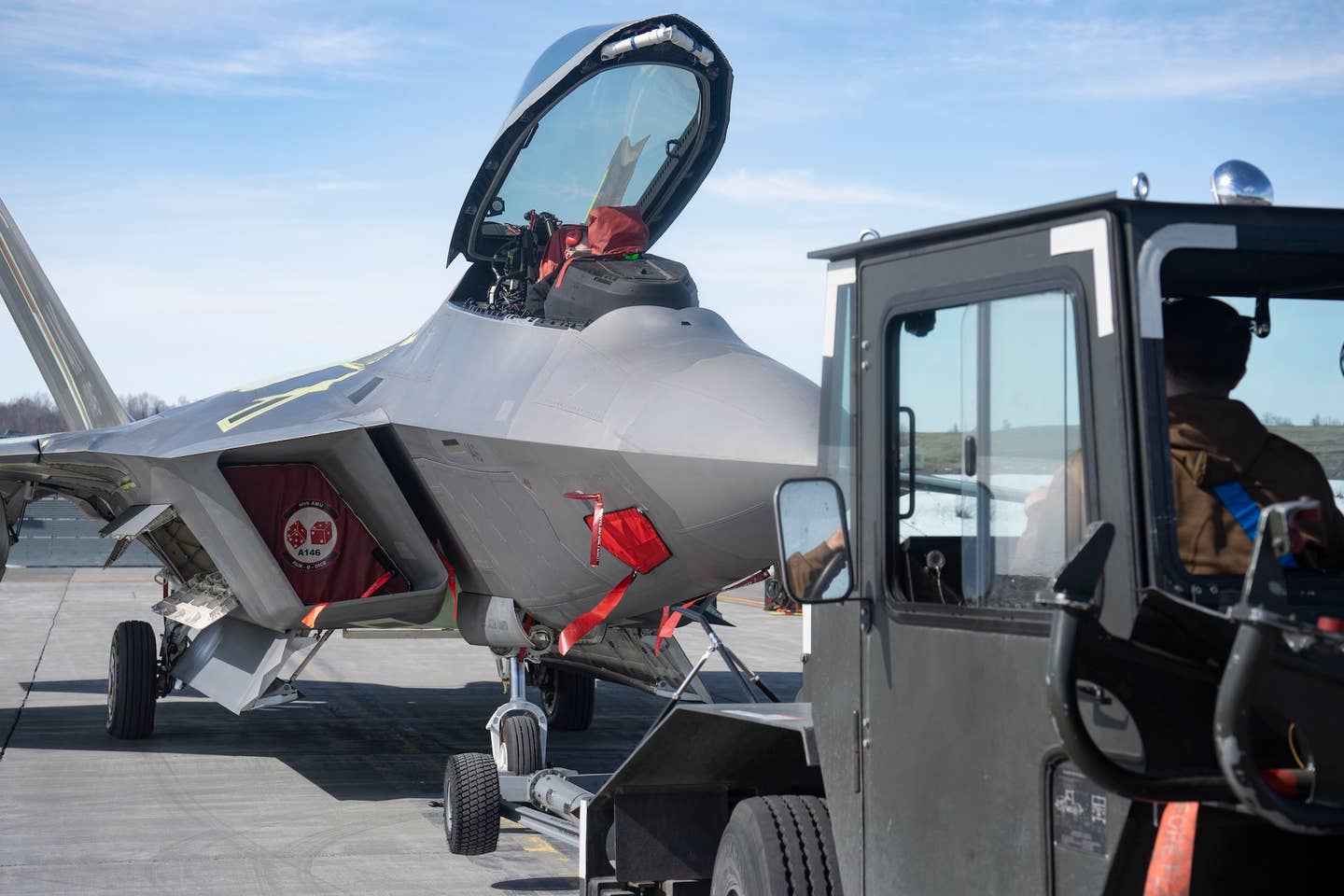 07-4146 is towed in preparation for an afterburner run at Joint Base Elmendorf-Richardson, Alaska, April 19, 2023. <em>U.S. Air Force photo by Airman 1st Class J. Michael Peña</em>