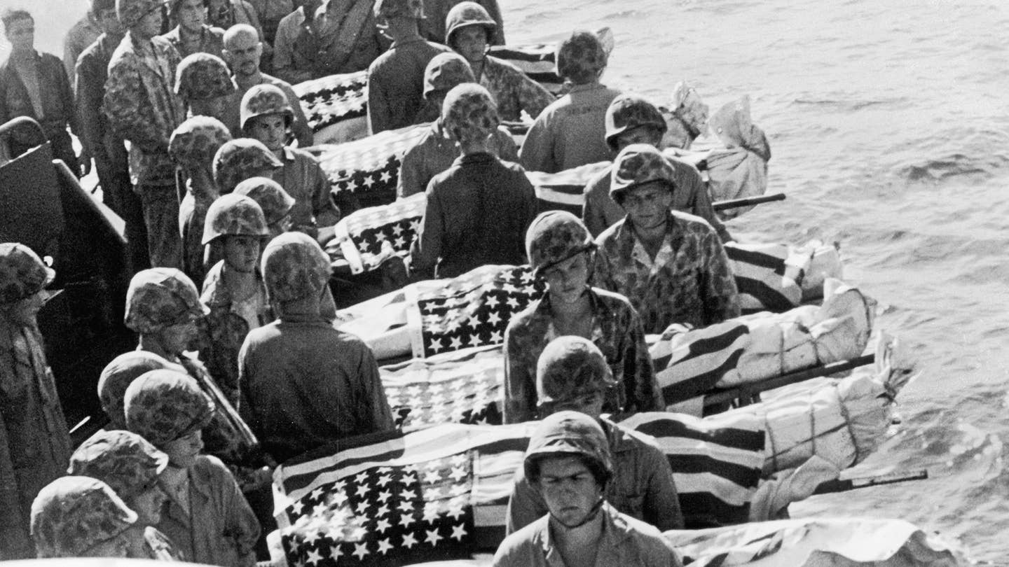 US Marine casualties of the Battle of Saipan are buried at sea, July 1944. 