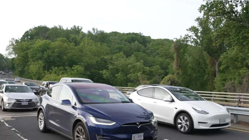 Fossil Fuel Protesters Block Road, Inadvertantly Block Tesla EVs