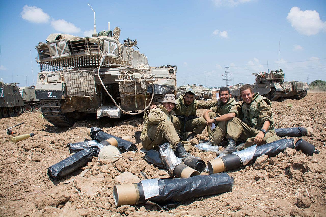 A particular unique feature of the Merkava tank is its internal compartment in the rear, which can carry troops and other gear. The compartment's door is seen open in this picture. <em>IDF</em>