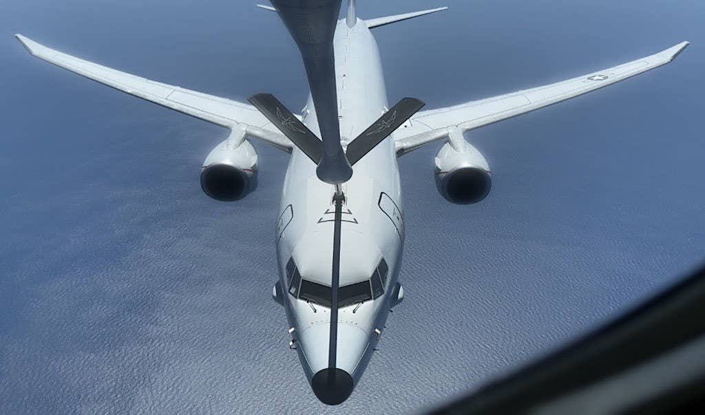 A US Navy P-8A Poseidon being refueled by a Metrea KC-135R. <em>Metrea</em>