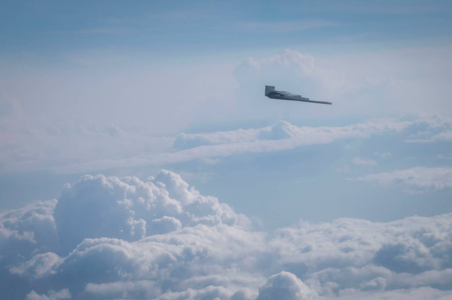 B-2 Spirit flies alongside a KC-46A Pegasus during RED FLAG-Alaska 23-3 over the Joint Pacific-Alaska Range Complex, Alaska, August 15, 2023. <em>U.S. Air Force photo by Airman 1st Class Andrew Britten</em>