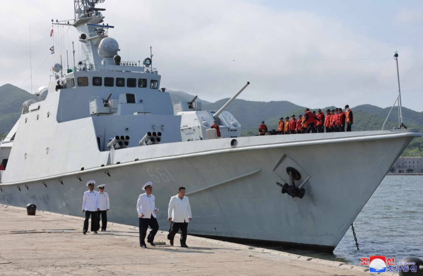 Below the 14.5mm machine guns, ahead of the superstructure, can be seen two of the five-tube launchers for rocket-assisted depth charges. <em>KCNA</em>