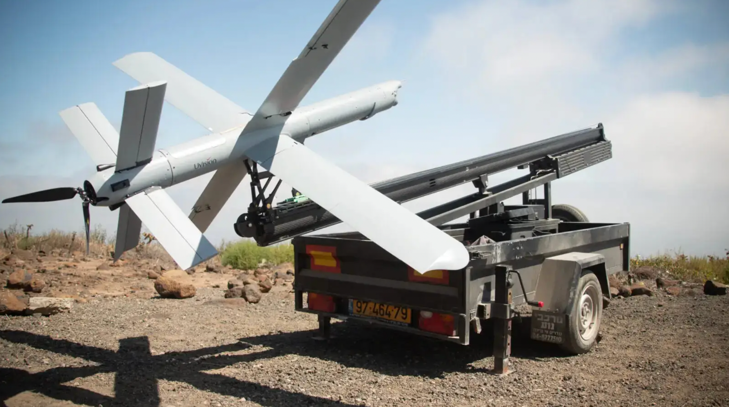 A UVision Hero-400 loitering munition on a trailer-mounted catapult launch system during a U.S. Marine Corps test in 2022. <em>USMC</em>