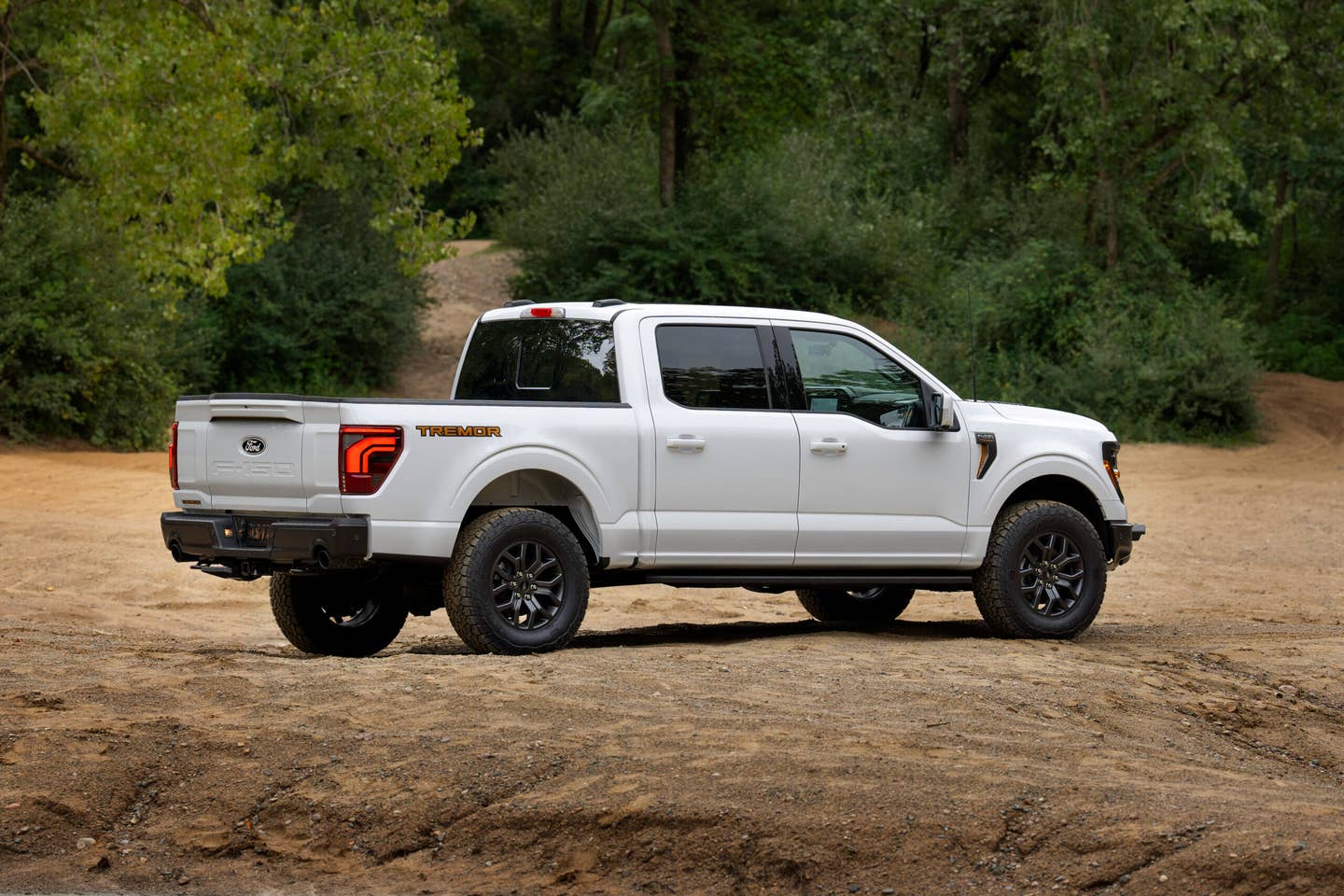 2024 Ford F-150 preproduction model shown with Ford accessories and optional equipment. Available Spring 2024. Actual production vehicle may vary. Professional driver on closed course. Always consult the Owner’s Manual before off-road driving, know your terrain and trail difficult, and use appropriate safety gear.