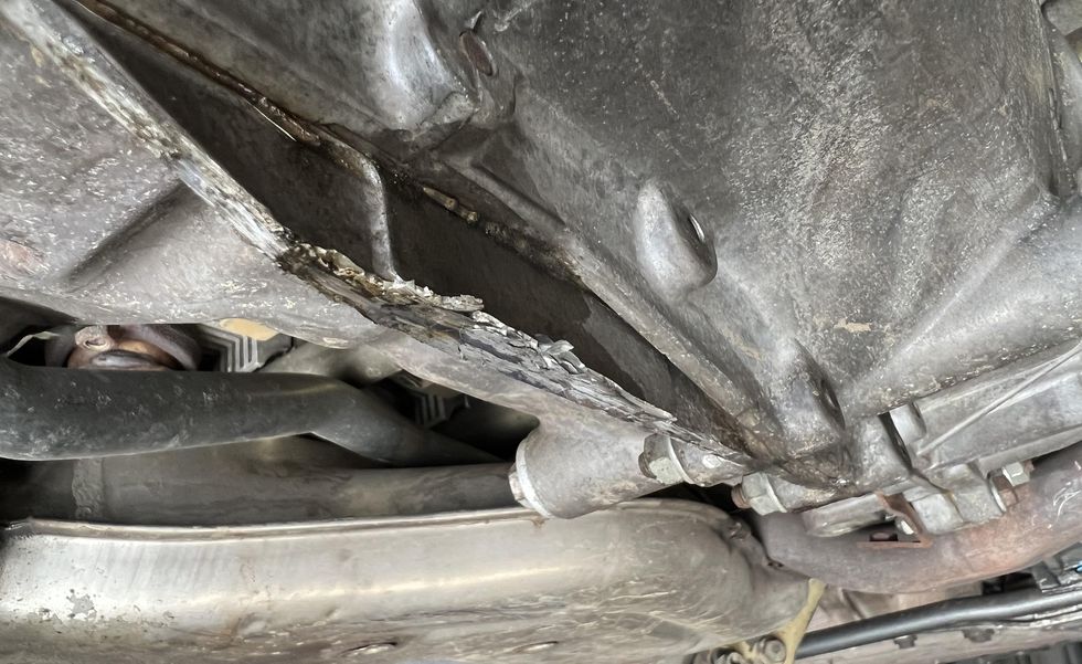 scraped up porsche 911 undercarriage