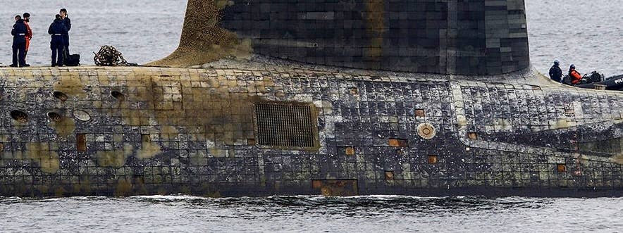 Missing anechoic tiles seen on the sub's exterior hull. <em>Sheila Weir</em>