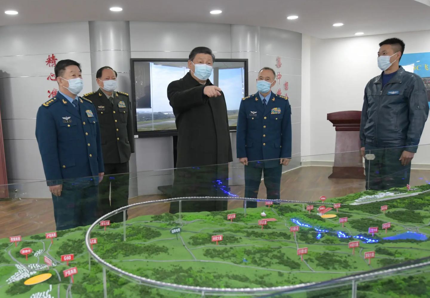 Chinese President Xi Jinping, also general secretary of the Communist Party of China CPC Central Committee and chairman of the Central Military Commission CMC, learns about the training of soldiers and officers during a visit to a PLA unit in southwestern Guizhou Province. <em>Xinhua/Li Gang via Getty Images</em>