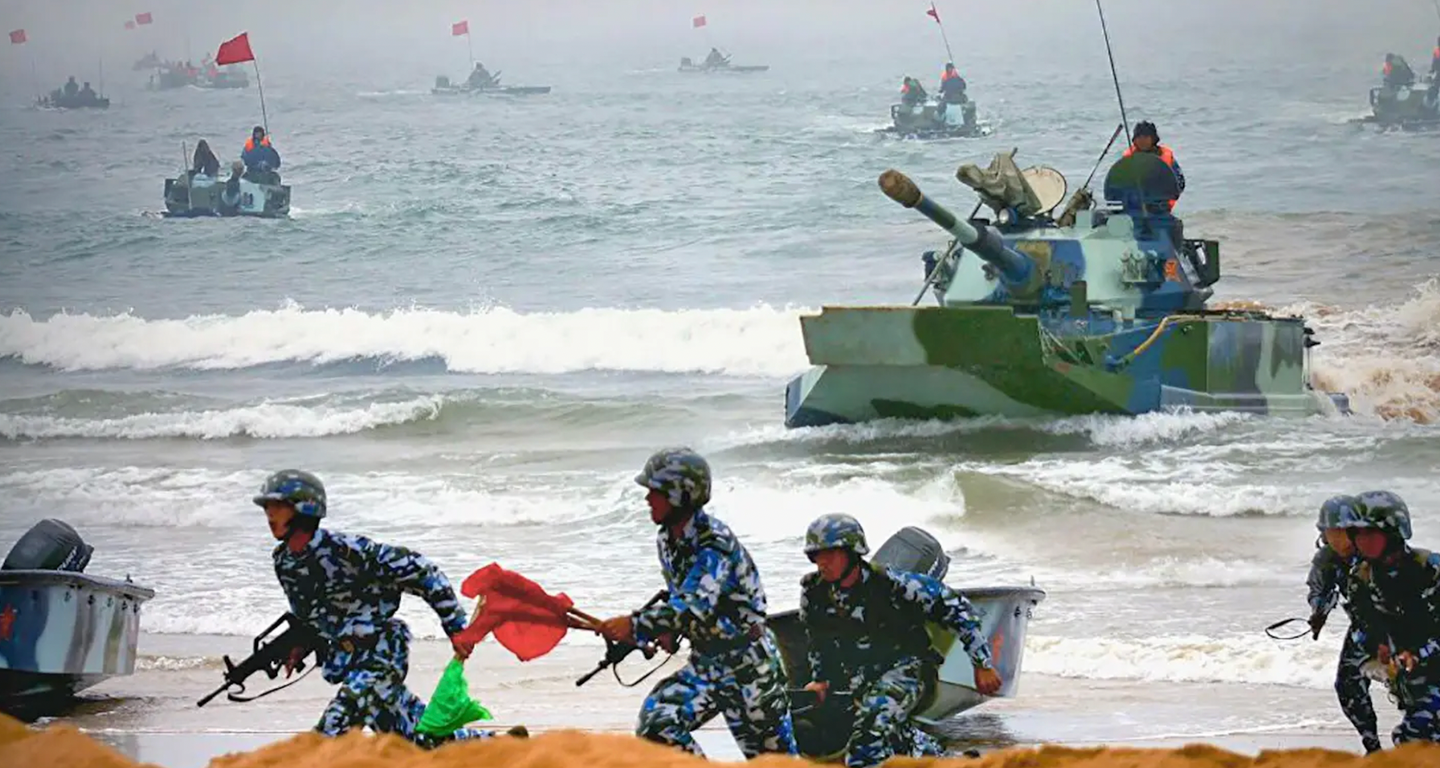 Chinese marines race ashore accompanied by amphibious tanks during a beach assault exercise. <em>PLA</em>