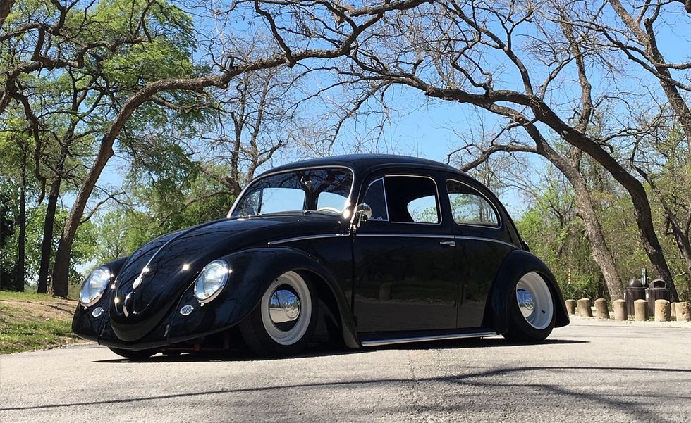 black vw beetle with stance