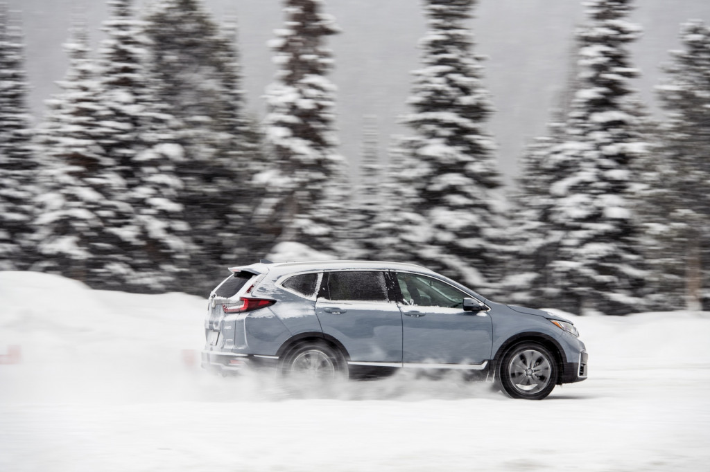 2020 Honda CR-V kicks up snow at the Winter Driving Encounter in Winter Park, CO. 