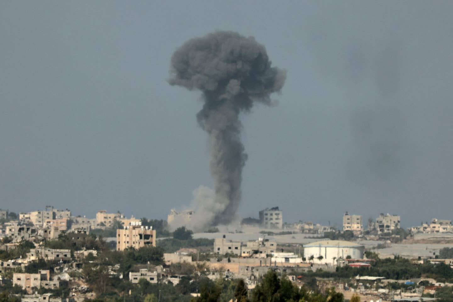 A picture taken from the southern Israeli city of Sderot on October 20, 2023, shows smoke ascending over the northern Gaza Strip following an Israeli strike. (Photo by Jack Guez / AFP) (Photo by JACK GUEZ/AFP via Getty Images)