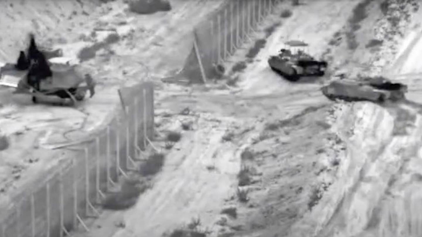 Israeli armoured vehicles take part in an operation, as the conflict between Israel and Hamas continues, at a location given as the northern Gaza Strip