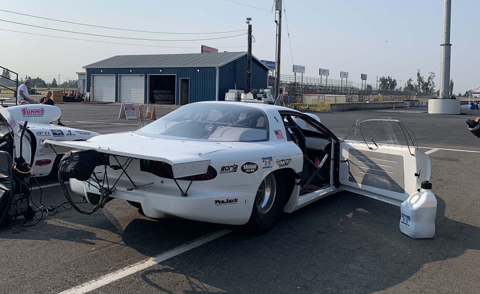 a white car with a door open