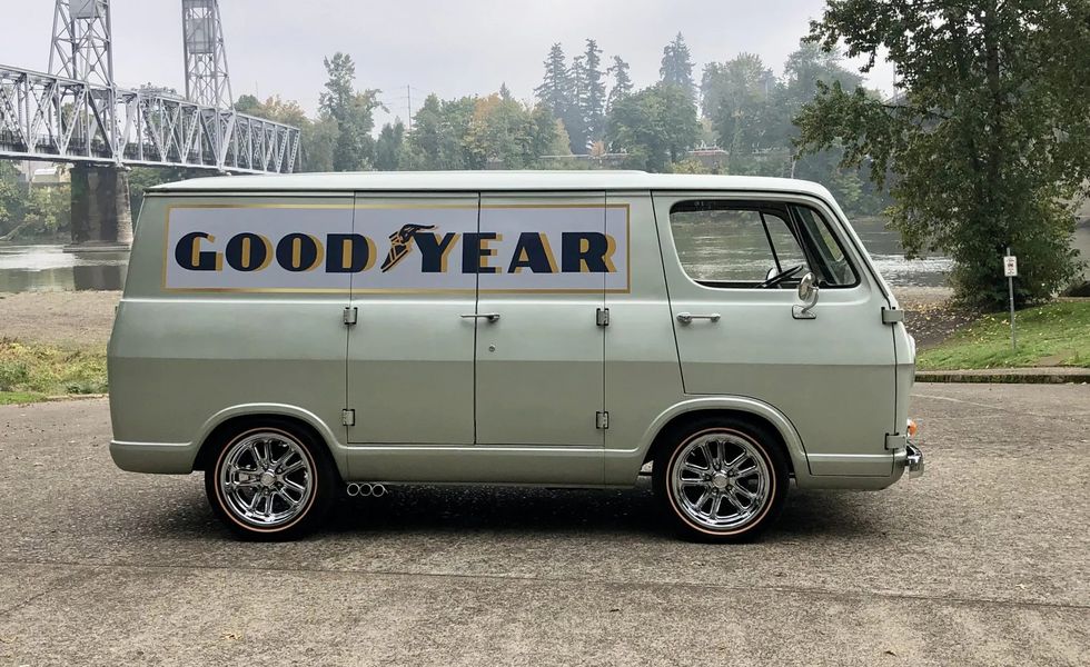 1965 chevrolet g10 panel van parked on a road