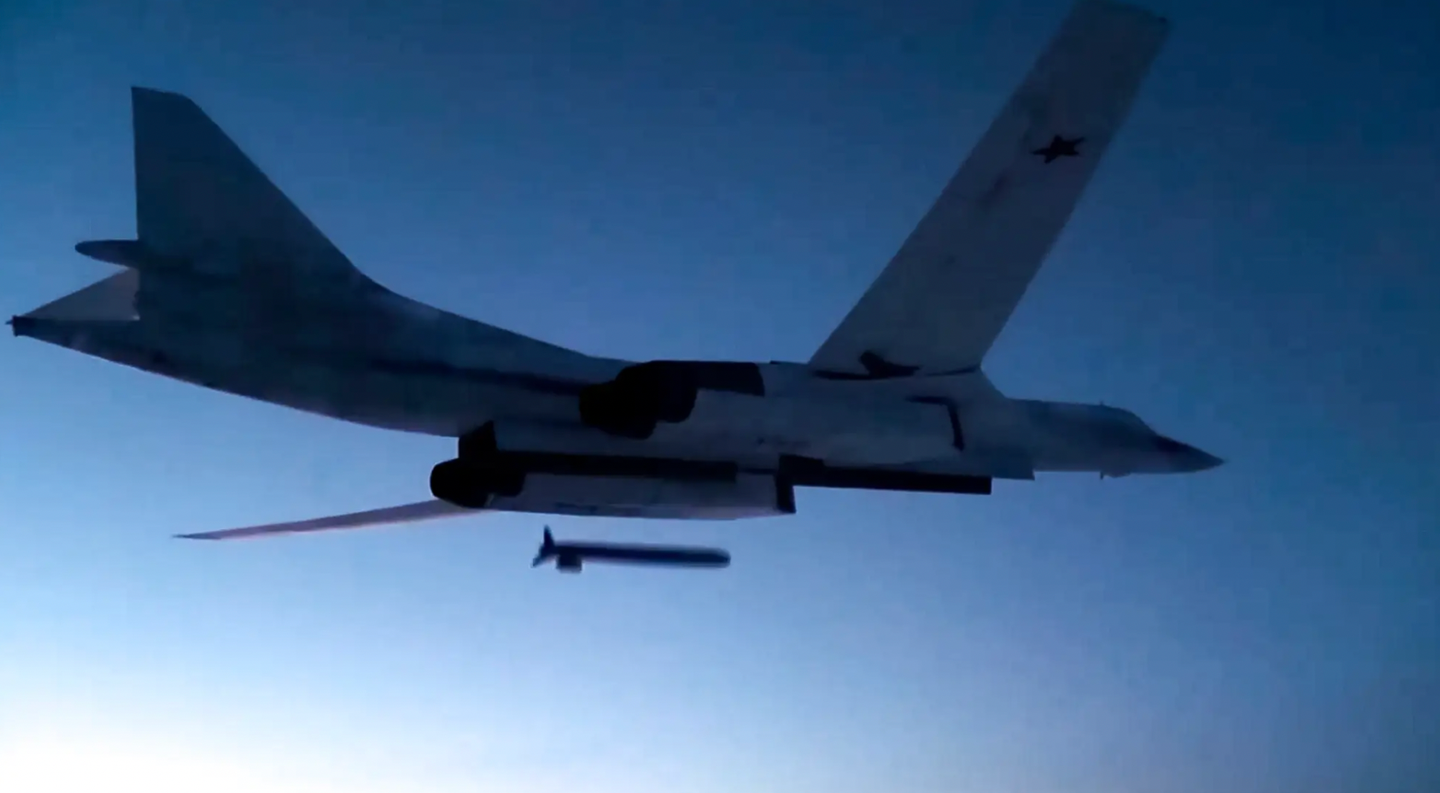 A Tu-160 launches a Kh-555 conventionally armed cruise missile at a test target during an exercise. <em>Russian Defense Ministry Press Service via AP</em>