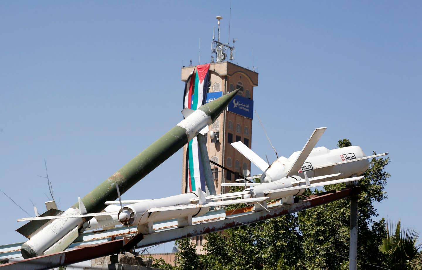 SANA'A, YEMEN - DECEMBER 07: Mock drones and missiles are displayed at a square on December 07, 2023 in Sana'a, Yemen. (Photo by Mohammed Hamoud/Getty Images)