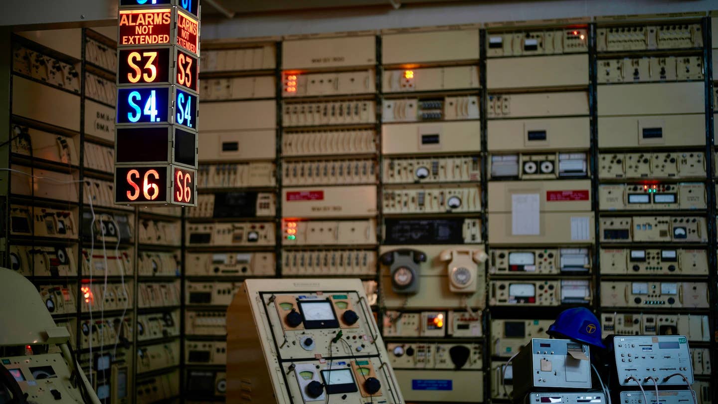 The British Telecom telephone exchange inside the former RAF Hack Green secret nuclear bunker on May 24, 2023 in Nantwich, England. Hack Green played a central role in the defence of Britain for almost sixty years. It was chosen during WW2 to protect the land between Birmingham and Liverpool from hostile attack and as a location for the new RADAR equipment. The bunker went on to be used for shelter and protection during the Cold War. The Secret Bunker is now privately owned by the Siebert family and is run as a museum trust. Photo by Christopher Furlong/Getty Images.