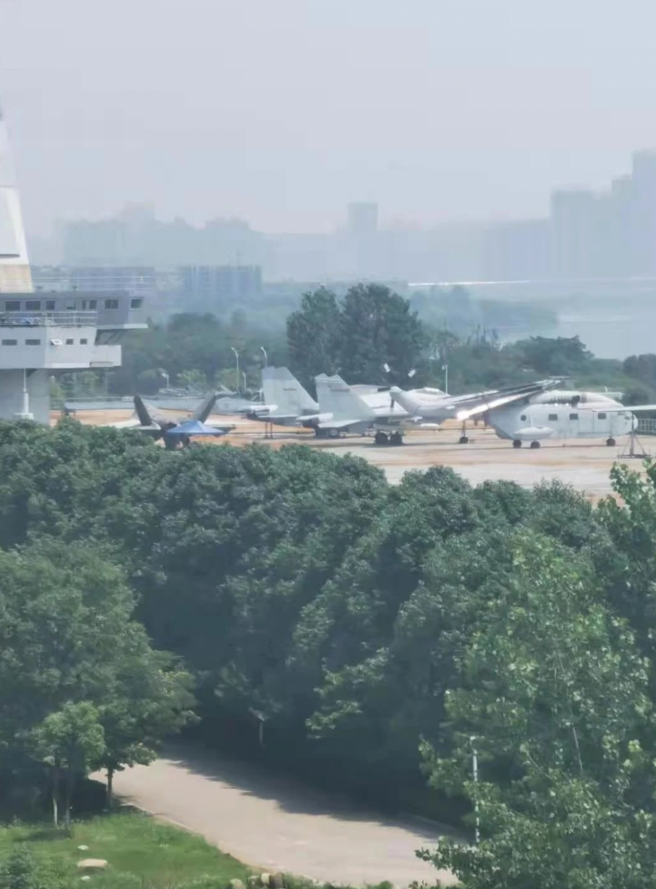 The dummy carrier at Wuhan, with the FC-31 mockup seen closest to the ‘island’. <em>via Twitter</em><br>