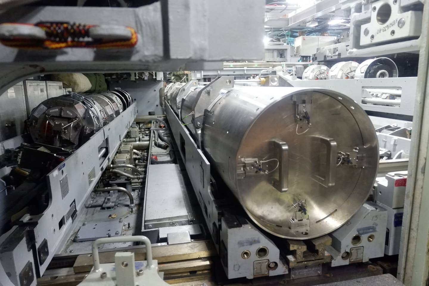 A canister containing a Yellow Moray UUV, at right, seen onboard the <em>Virginia</em> class submarine USS <em>Delaware</em> as part of the recent end-to-end test of this uncrewed system. <em>USN</em>