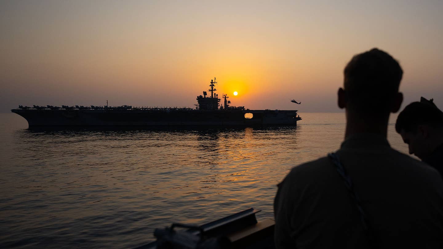 Jan. 8, 2024) The Arleigh Burke-class guided-missile destroyer USS Mason (DDG 87) conducts a vertical replenishment with the Nimitz-class aircraft carrier USS Dwight D. Eisenhower (CVN 69) while the ships operate in support of Operation Prosperity Guardian (OPG) in the Red Sea, Jan. 8. (U.S. Navy photo by Mass Communication Specialist 1st Class Chris Krucke)