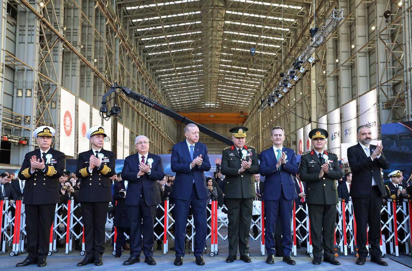 Turkish President Erdogan (C) attends the naval platforms delivery ceremony in Yalova, Turkey, on January 19, 2024. <em>Photo by Turkish Presidency/Murat Cetinmuhurdar/Anadolu via Getty Images</em>