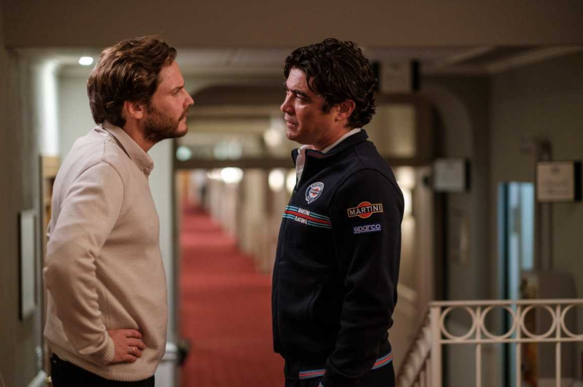 Confrontation between Roland Gumpert (Daniel Brühl) and Cesare Fiorio (Riccardo Scamarcio) after the Monte Carlo Rally. <em>HanWay Films</em>