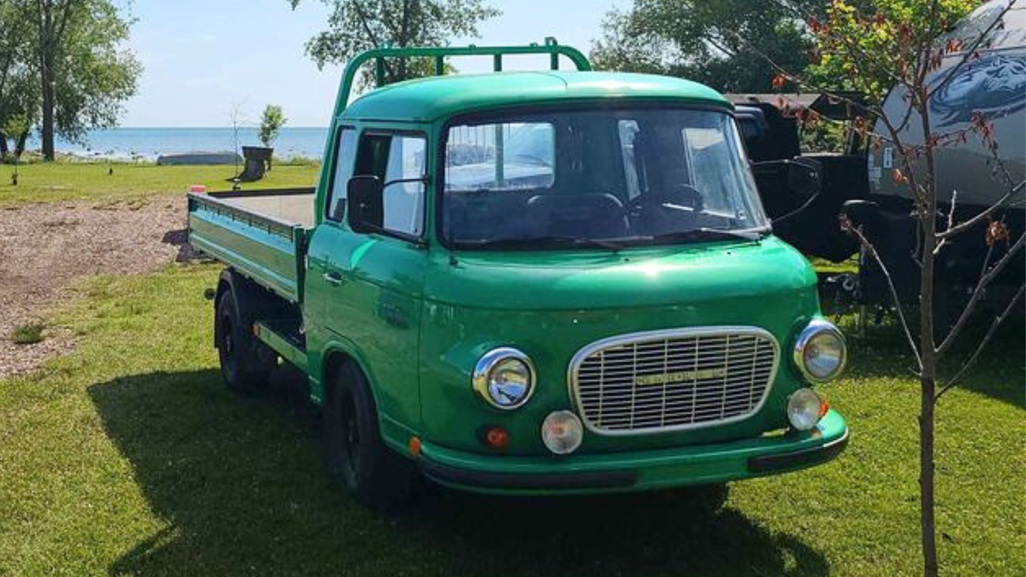 green truck 3/4 front view