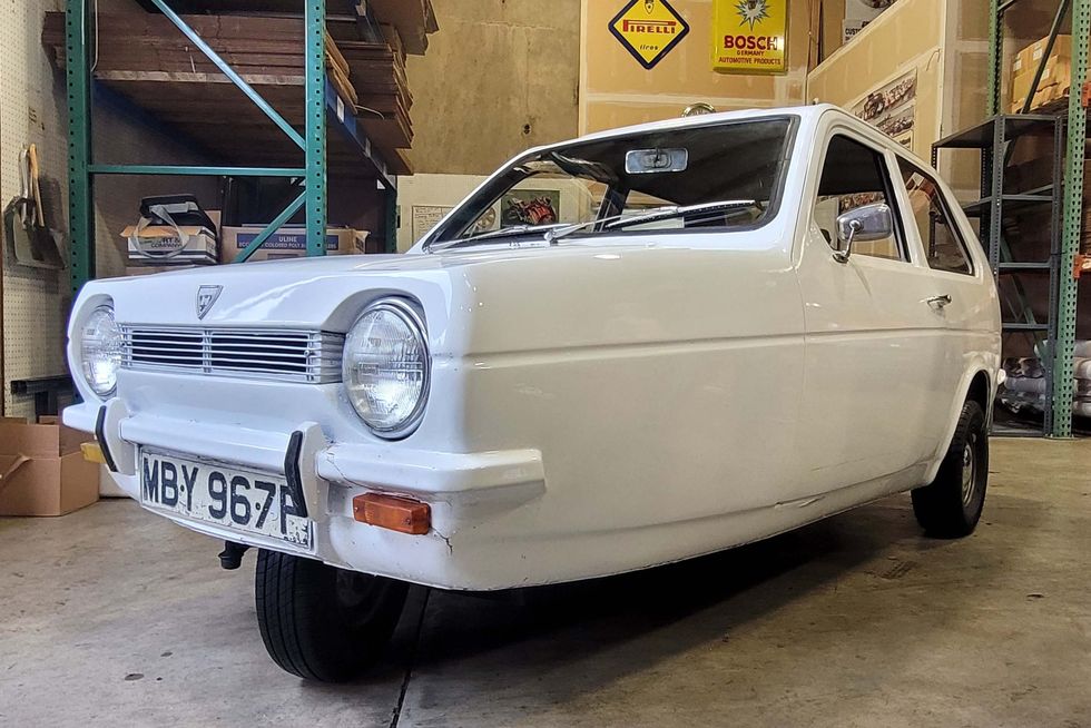 a white car parked in a garage