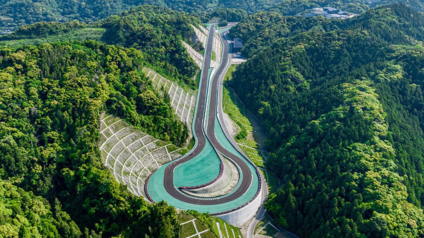 green racetrack in mountains